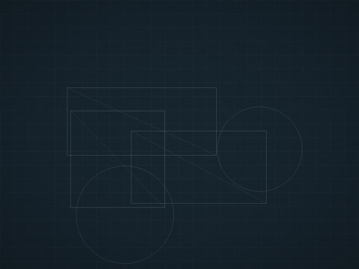 Technical drawings and material samples on a desk